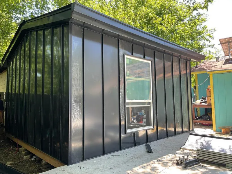 Black standing seam metal wall panels for Roof Inspection in Lake Norman of Catawba